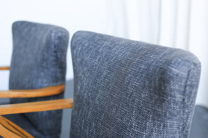 A Pair of Elegant Mid-Century Chairs
