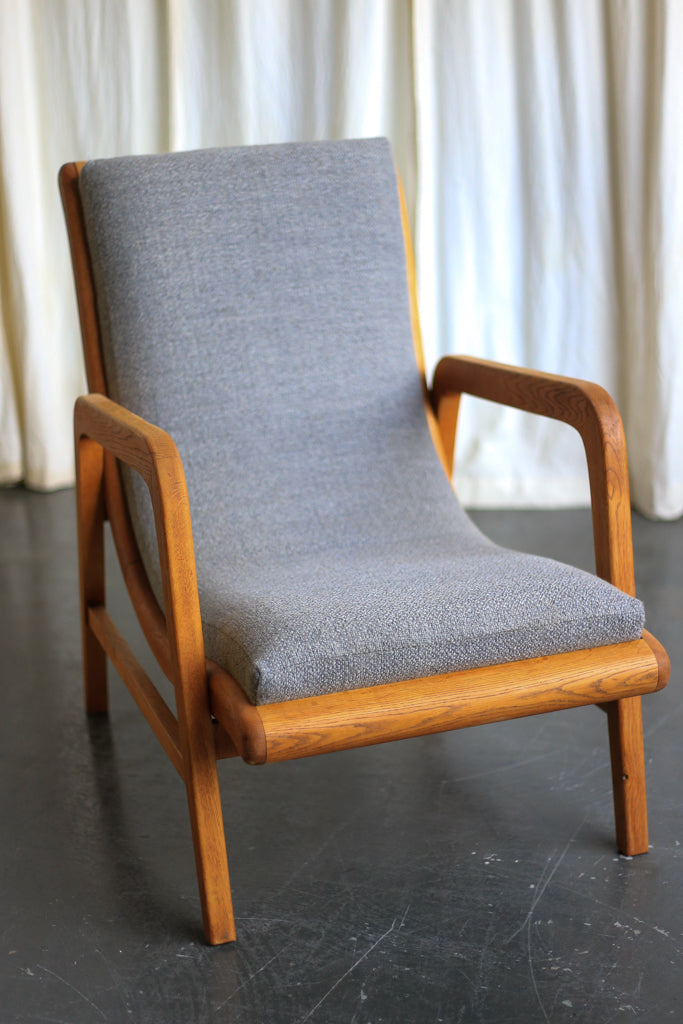 A Pair of Oak 'Strongbow' MCM Armchairs