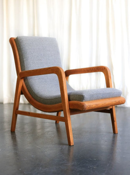 A Pair of Oak 'Strongbow' MCM Armchairs